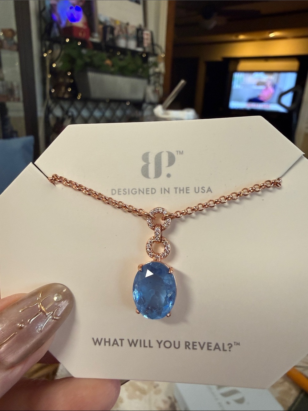 bp Rose Gold Necklace with Faceted Blue Oval Pendant